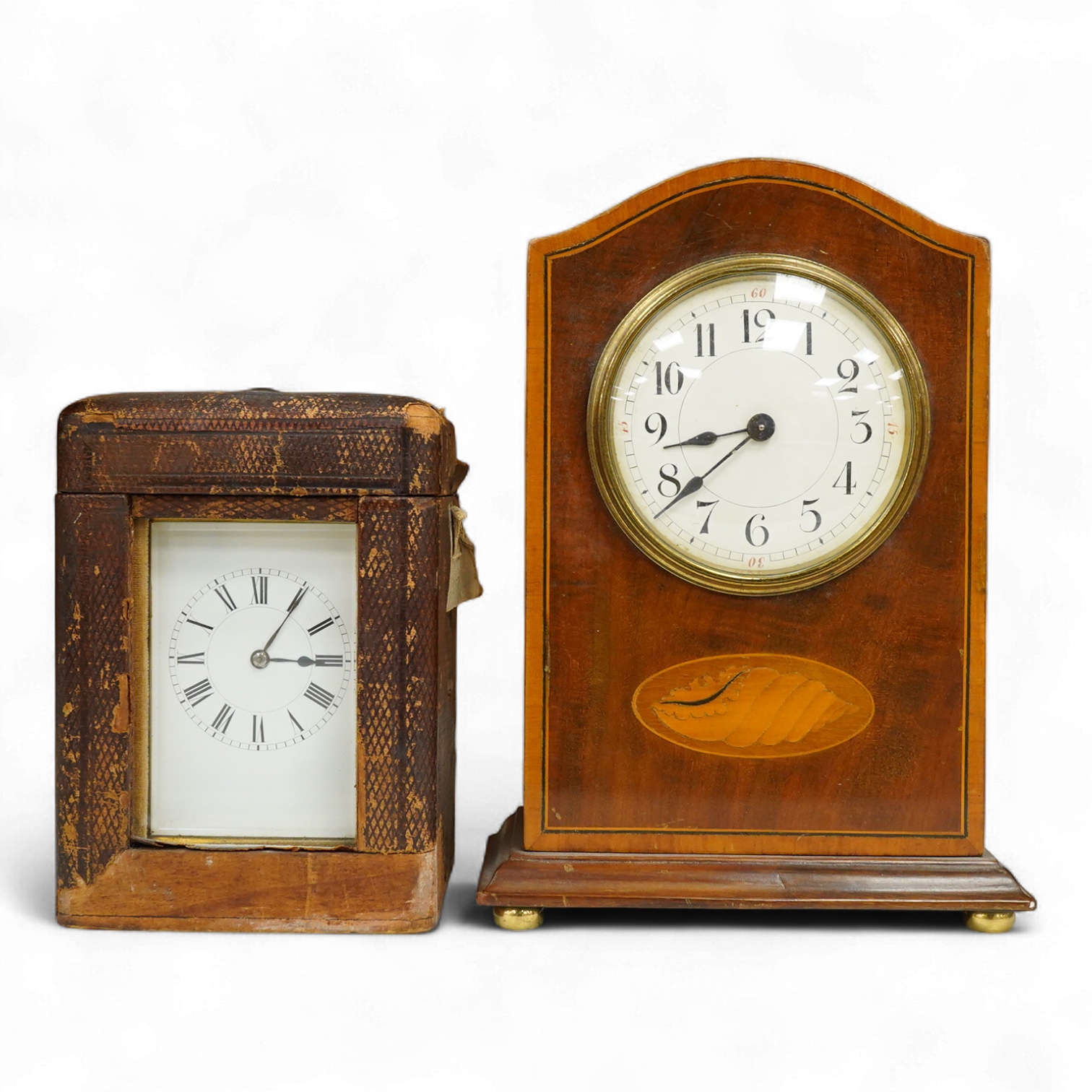 A late 19th century lacquered brass repeating carriage clock, by Henri Jacot and an Edwardian inlaid mantel timepiece with key, largest 23cm high